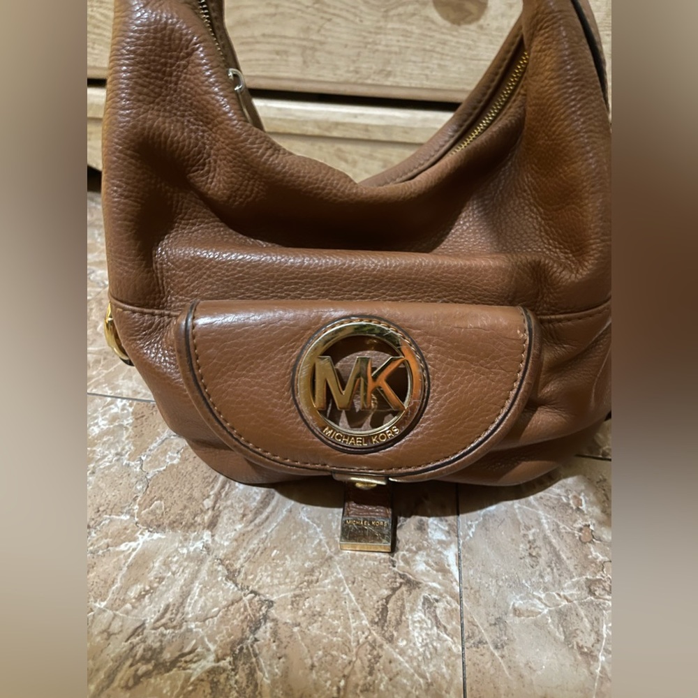 Brown Michael kors purse.